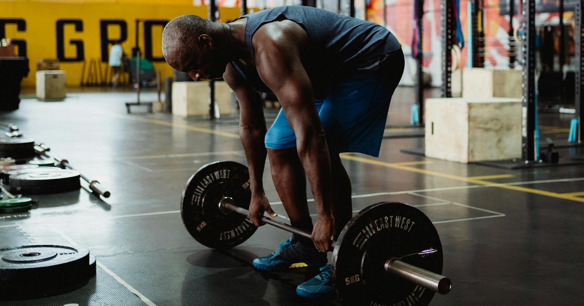 Olympic Weightlifting Power Ratios: How Strength-to-Weight Metrics Predict Medal Success